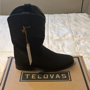 New with tag, boots never worn. Size 12 D